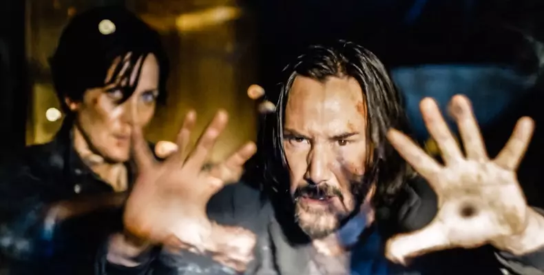 Keanu Reeves and Carrie-Anne Moss