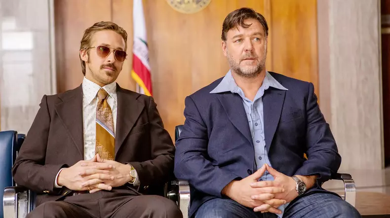 THE NICE GUYS 2016 Warner Bros. Pictures film with Ryan Gosling at left as Holland March and Russell Crowe as Jackson Healey