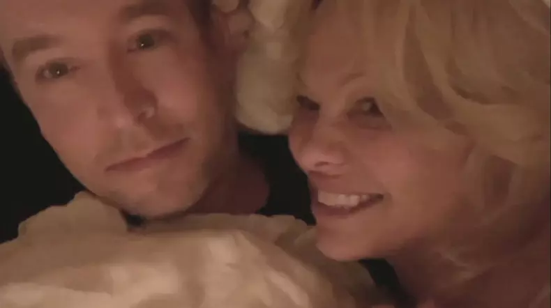 Pamela Anderson and new husband do TV interview from their bed