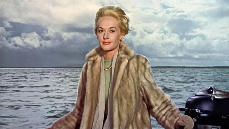 USA. Tippi Hedren in a scene from the ©Universal Pictures movie: The Birds (1963).PLOT: A wealthy San Francisco socialite pursues a potential boyfriend to a small Northern California town that slowly takes a turn for the bizarre when birds of all kinds s
