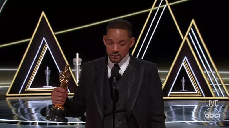 Will Smith turns on the tears as he uses Best Actor Oscar win speech to defend shocking on-air assault on Chris Rock for joke about wife Jada Pinkett Smith's 'GI Jane' haircut.