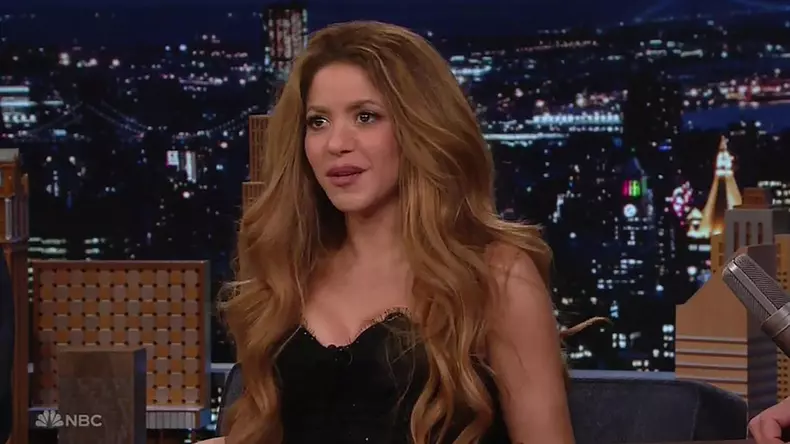 Shakira alludes to her split from ex Gerard Piqué before she dons racy leather chaps to perform breakup hit for the first time on The Tonight Show