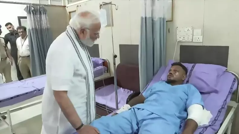 Indian Prime Minister Modi meets miracle survivor of Air India crash