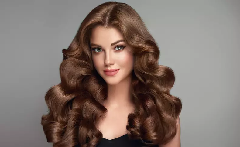 Beautiful,Brunette,Model,Girl,With,Long,Curly,Hair,.,Smiling