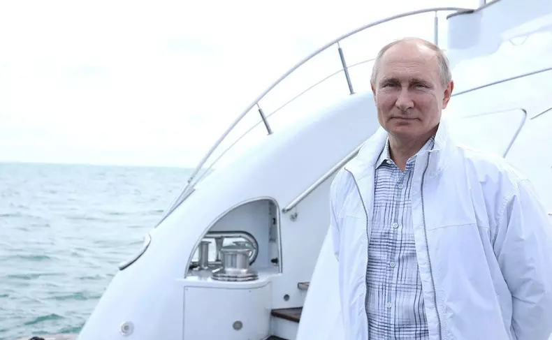 Sochi, Russia. 29th May, 2021. Russian President Vladimir Putin waits on the deck of a yacht to welcome Belarus President Alexander Lukashenko on the Black Sea May 29, 2021 in Sochi, Russia. Credit: Planetpix/Alamy Live News