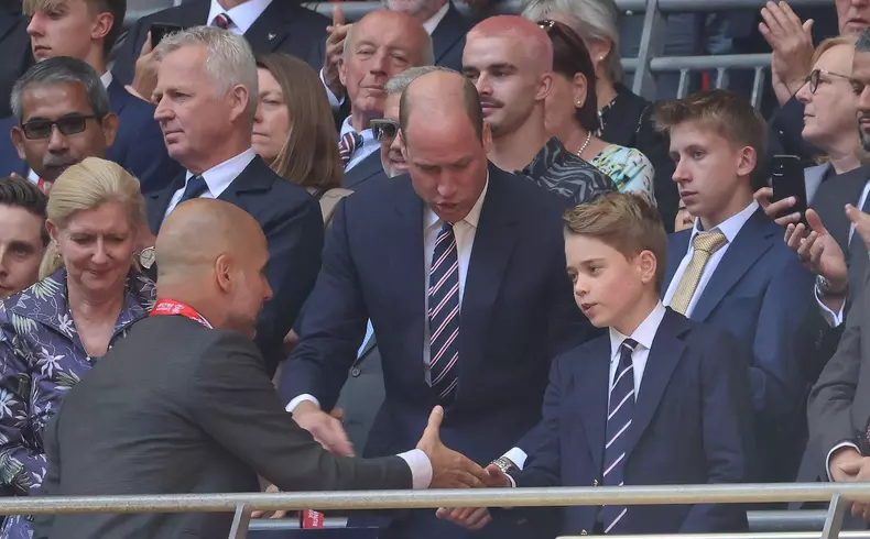 London, UK. 25th May, 2024. LONDON, ENGLAND - L-R HRH William, Price of Wales Manchester City manager Pep Guardiola shanks hands George afterThe Emirates FA Cup Final soccer match between Manchester City and Manchester United at Wembley Stadium on 25th Ma