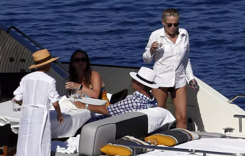 EXCLUSIVE: Sharon Stone enjoys a boat trip with friends in Sicily