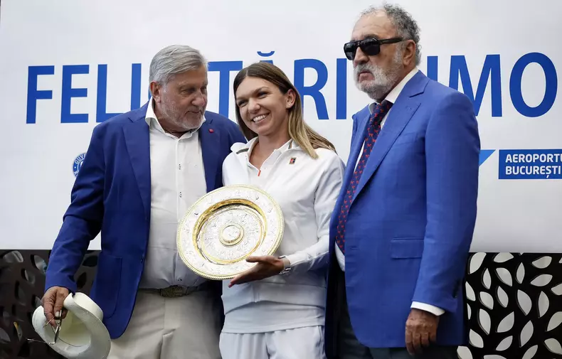 Wimbledon Championships winner  Simona Halep arrives in Romania