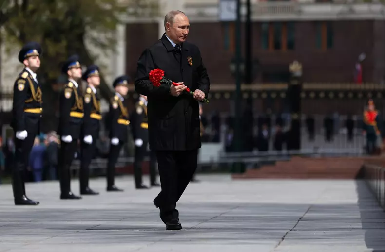 Russian President Vladimir Putin attends a flower-laying ceremony