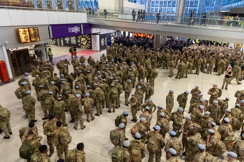Soldiers and mourners arrive at Waterloo Station for the Queen's funeral, London, UK - 19 Sep 2022