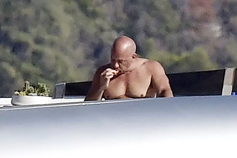 *EXCLUSIVE* *WEB MUST CALL FOR PRICING* The American all action hero Vin Diesel showing off his rather large belly on his family holiday joined by Zoe Saldana and husband Marco Perego out in Portofino.