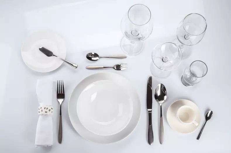 Table setting on white background