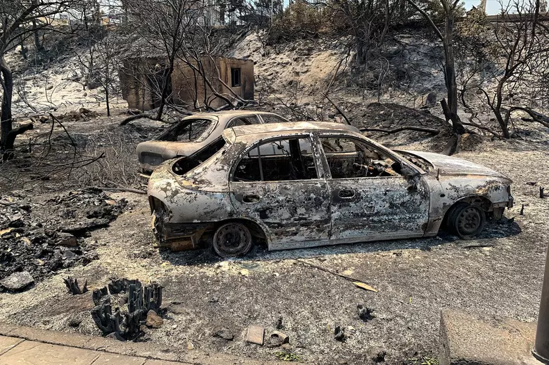 Local people and tourists have been evacuated from area after wild fires broke out on the island of Rhodes, Greece