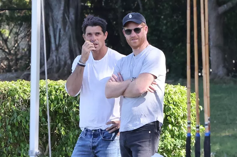 A solo Prince Harry films at the Royal Salute Polo Challenge in Palm Beach