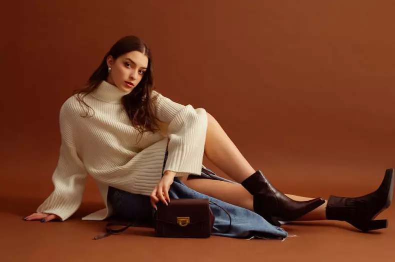 Fashionable,Confident,Woman,Wearing,White,Sweater,,Denim,Skirt,,Pointed,Toe