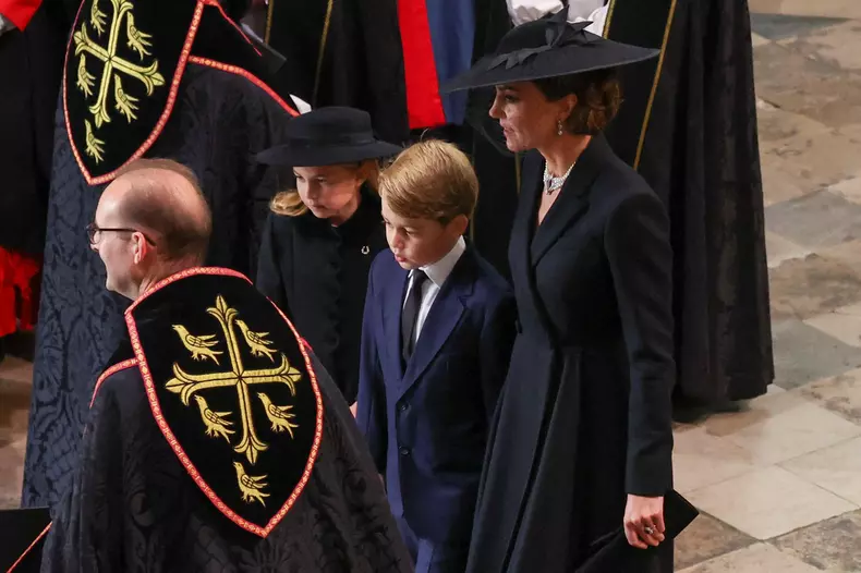 Prince William, Prince of Wales, Catherine, Princess of Wales, Princess Charlotte and Prince George arrive, on the day of the state funeral and burial of Britain's Queen Elizabeth, at Westminster Abbey in London, Britain, September 19, 2022.