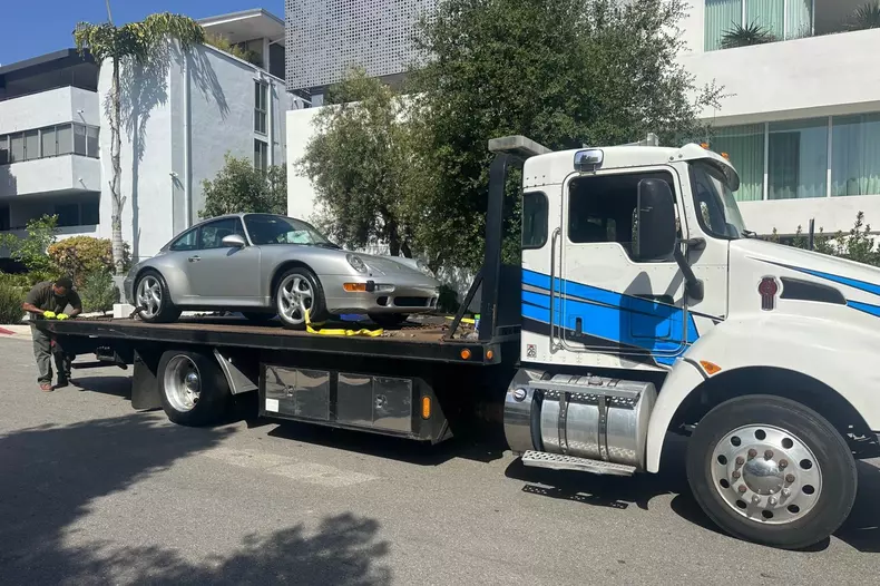 *EXCLUSIVE* Bianca Censori's Porsche 911 towed in afternoon Mishap
