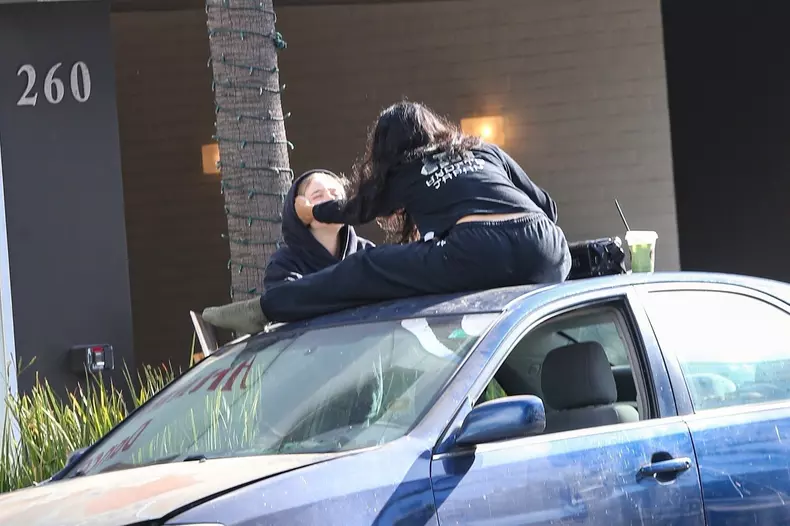 *PREMIUM-EXCLUSIVE* Shiloh Jolie was spotted showing off a little PDA with her girlfriend as they had lunch on top of a car in Los Angeles **SHOT ON 11/15/24**