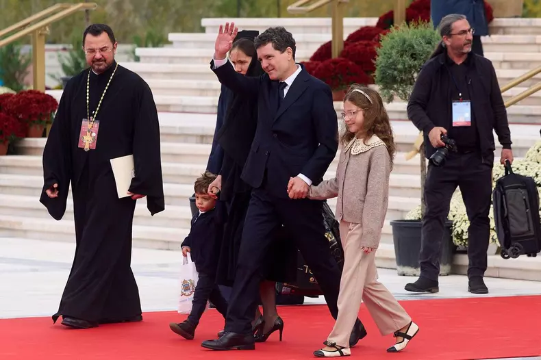 Bucharest, Romania. 26th Oct, 2025: Nicusor Dan, the President of Romania, with his partner, Mirabela Gradinaru, and their children, Aheea Dan and Antim Dan, leave after attending the consecration of the interior mosaic icons of the Romanian National Cath