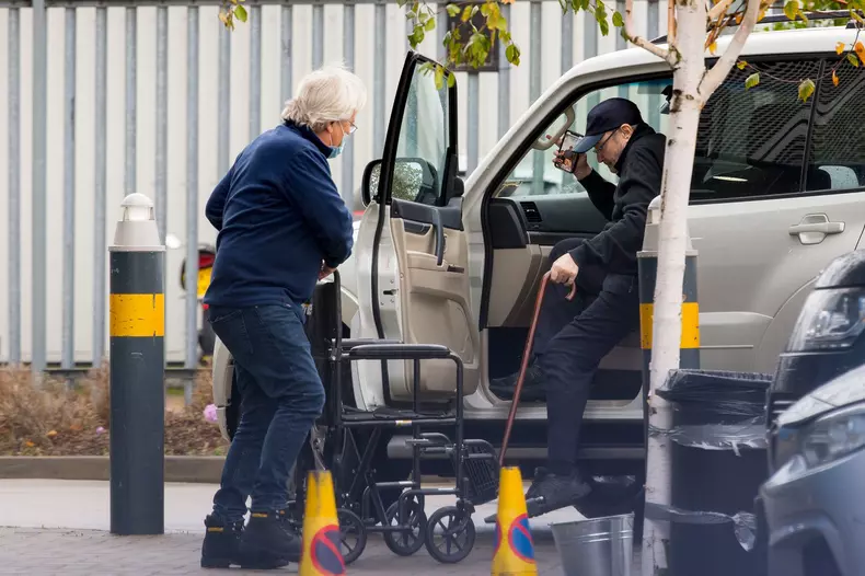 *PREMIUM EXCLUSIVE - NO WEB UNTIL 09.00 AM EST 29TH OCTOBER** A frail looking Phil Collins is helped into a wheelchair amid his ongoing battle to evict ex-wife Orianne Cevey from his $32 million Miami mansion.