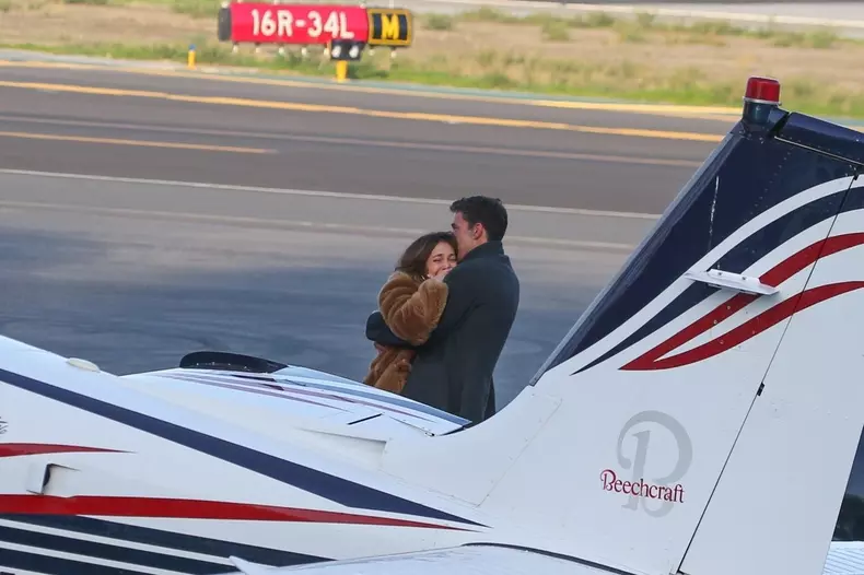 *EXCLUSIVE* Ben Affleck and Jennifer Lopez pack on the PDA as her pilot waits ahead of a flight out of LA