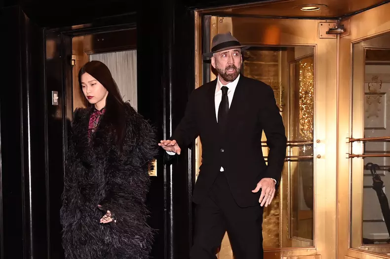 Nicolas Cage and his wife Riko Shibata are photographed leaving their New York City hotel on thier way to Gotham Awards this evening