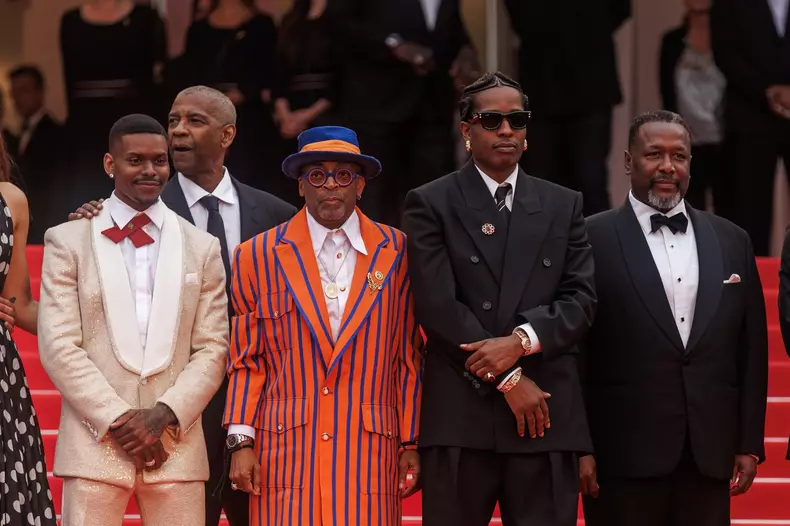 Celebrities attending the red carpet of the film Highest 2 Lowest with Asap Rocky, Spike Lee and Denzel Washington during the 78th Cannes Film Festival.