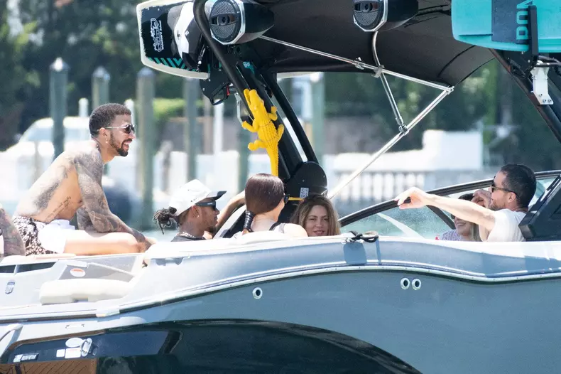 Shakira sparks new romance rumors as she enjoys Miami boat trip with F1 megastar Lewis Hamilton hours after the pair crossed paths at a fancy restaurant.