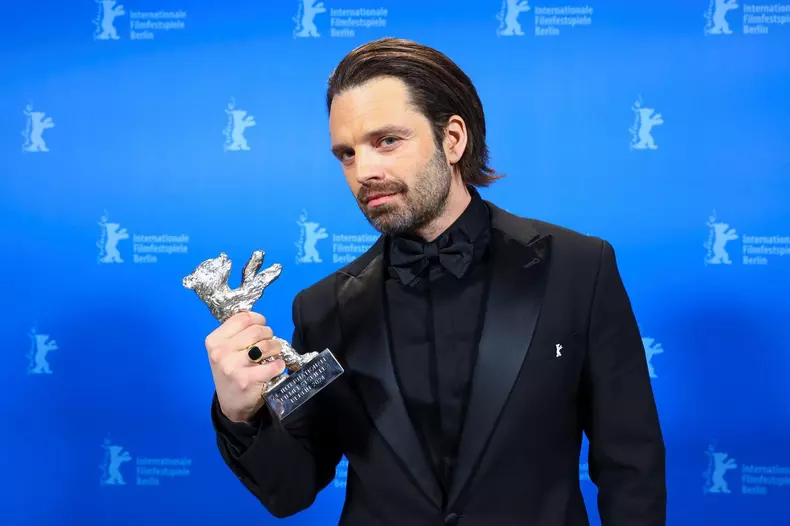 Berlin, Germany. 24th Feb, 2024. Sebastian Stan poses with the Silver Bear for Best Leading Actor for "A Different Man" backstage during the award ceremony at the 74th Berlin International Film Festival. Credit: Nadja Wohlleben/Reuters/Pool/dpa/Alamy Live