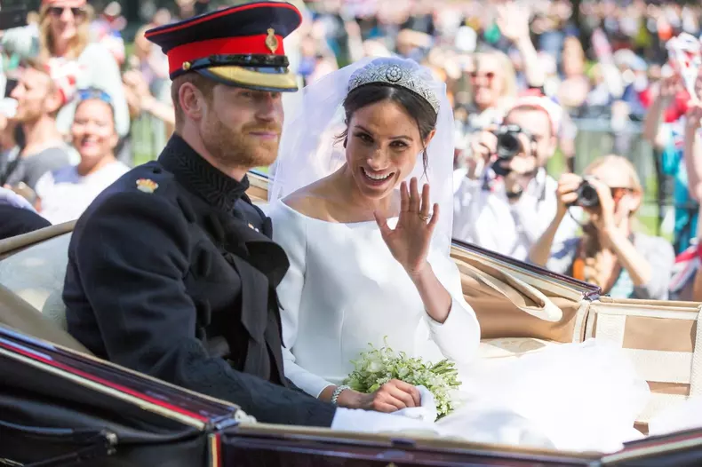 Picture dated May 19th shows Prince Harry and Meghan Markle greeting the crowds in Windsor on Kings Road after their wedding.

 Prince Harry and Meghan Markle have been declared husband and wife, following a ceremony at Windsor Castle.
The couple exchange