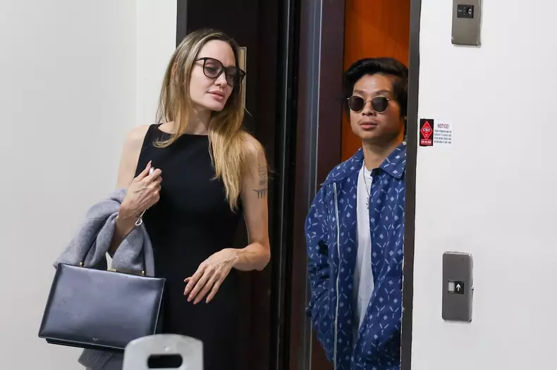 *EXCLUSIVE* Angelina Jolie is spotted on a mother/son dinner night at Sushi Park in West Hollywood and Pax pays on his AMEX!