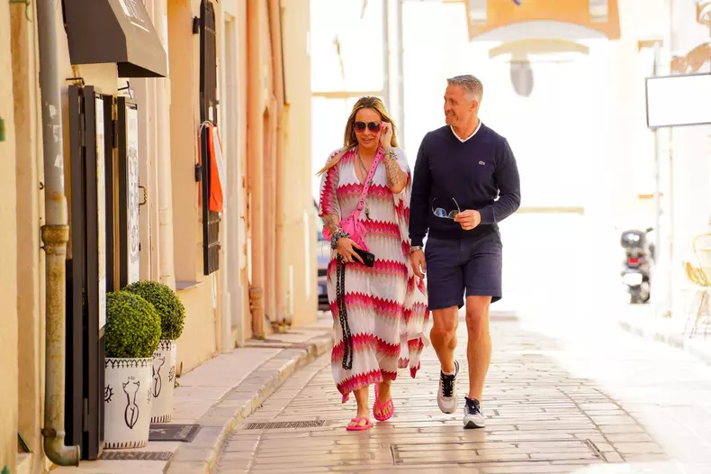 EXCLUSIVE: Ralf Schumacher and ex-wife Cora stroll arm-in-arm through St Tropez - sparking speculation they have reunited eight years after their bitter divorce