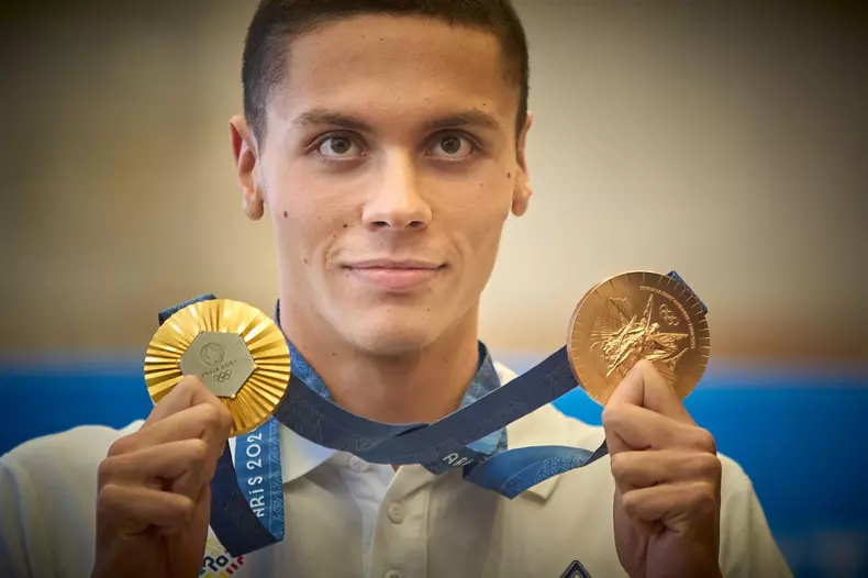 Otopeni, Romania. 2nd Aug, 2024: Romanian Olympic gold medalist swimmer David Popovici returns from Olympic Games Paris 2024 at Bucharest Henri Coanda International Airport, in Otopeni, Romania. Popovici won the gold medal in the men's 200m freestyle and