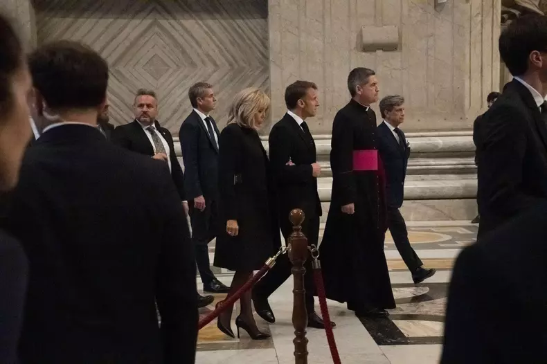 Brigitte Macron (L) and Emannuel Macron (R), guests of honor in the church during the commemoration of the death of Pope Francis before the the funeral scheduled for April 26, 2025.
