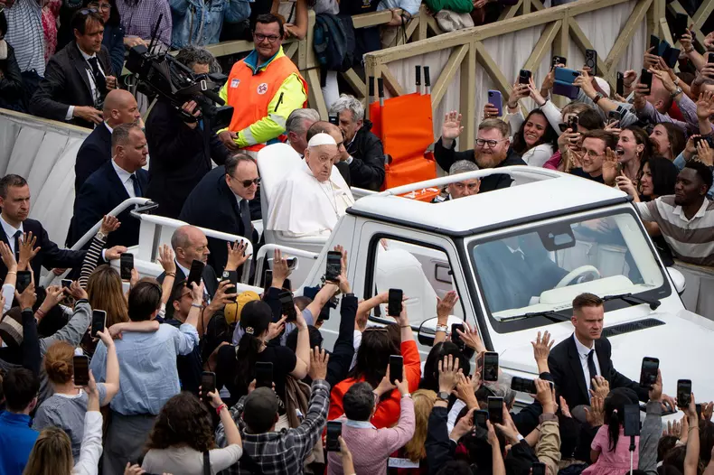 Pope Francis tours St. Peter's Square in his popemobile after bestowing the ‘Urbi et Orbi’ Blessing from the balcony of St. Peter's basilica overlooking St. Peter's Square in Vatican City.