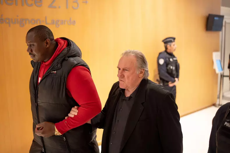 French actor Gerard Depardieu returns to the courtroom after a break on the third day of his trial in which he is charged with sexually assaulting two women during a film shoot in 2021, at the Paris criminal court in the Tribunal de Paris courthouse, on M