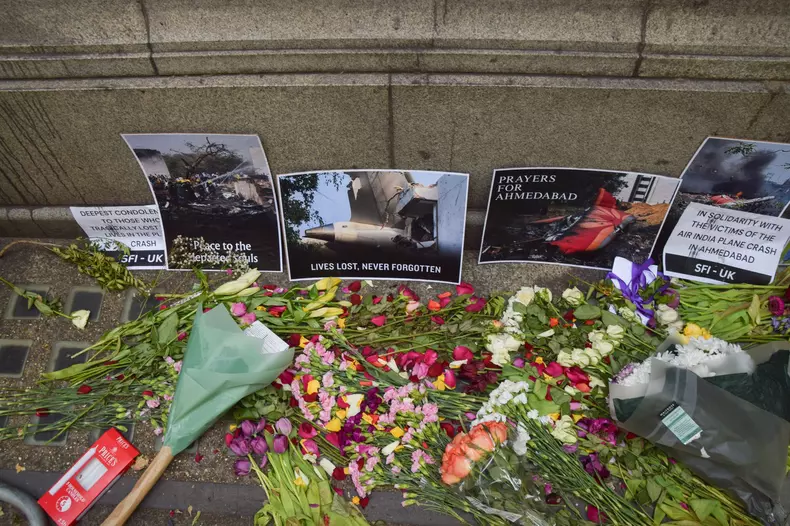 Floral Tributes Outside India House For Victims Of The Ahmedabad Plane Crash