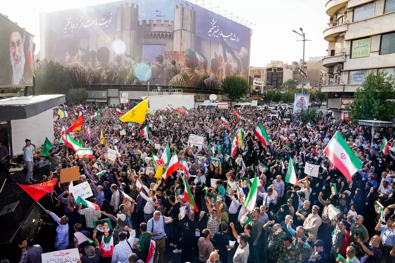 Iranian President, Masoud Pezeshkian, participates in a protest against the US bombing of Iran