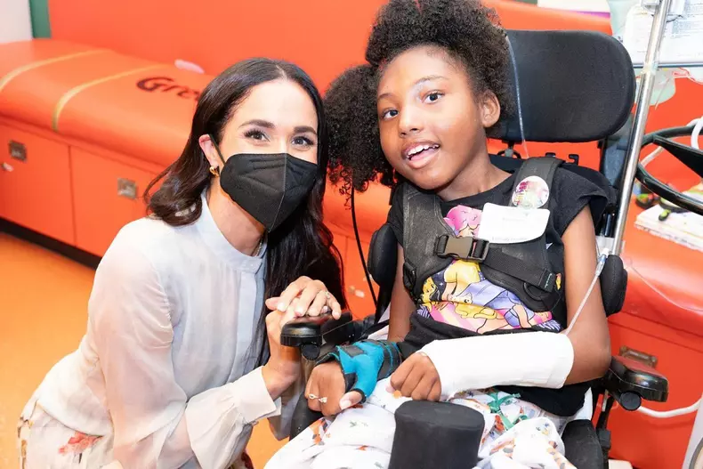 Meghan Markle reads to youngsters at Children’s Hospital Los Angeles during a visit on March 21