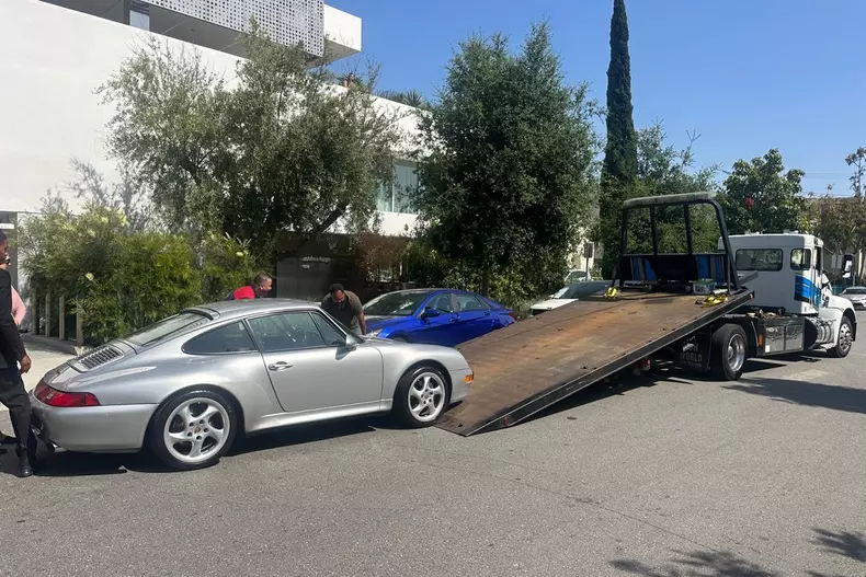 *EXCLUSIVE* Bianca Censori's Porsche 911 towed in afternoon Mishap