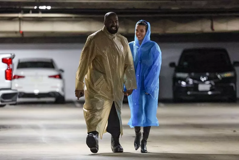*PREMIUM-EXCLUSIVE* Kanye West and Bianca Censori spotted in striking raincoats and little else during a shopping spree at Century City Mall