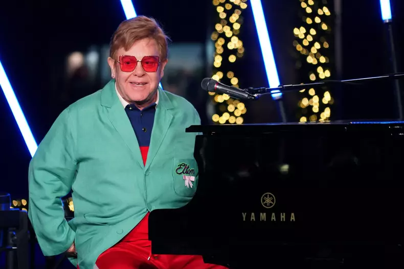 Elton John Performs At Saks Holiday Window Unveiling