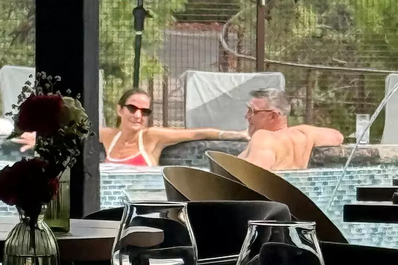 EXCLUSIVE: *PREMIUM RATES* New England Patriots’ Mike Vrabel and top NY Times NFL reporter Dianna Russini hold hands and hug at luxury hotel