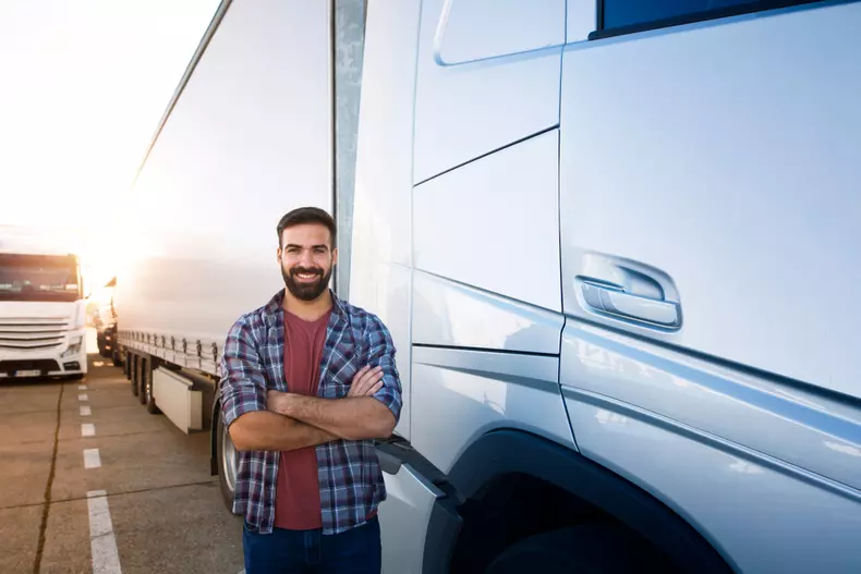 Portrait,Of,Young,Bearded,Man,Standing,By,His,Truck.,Professional