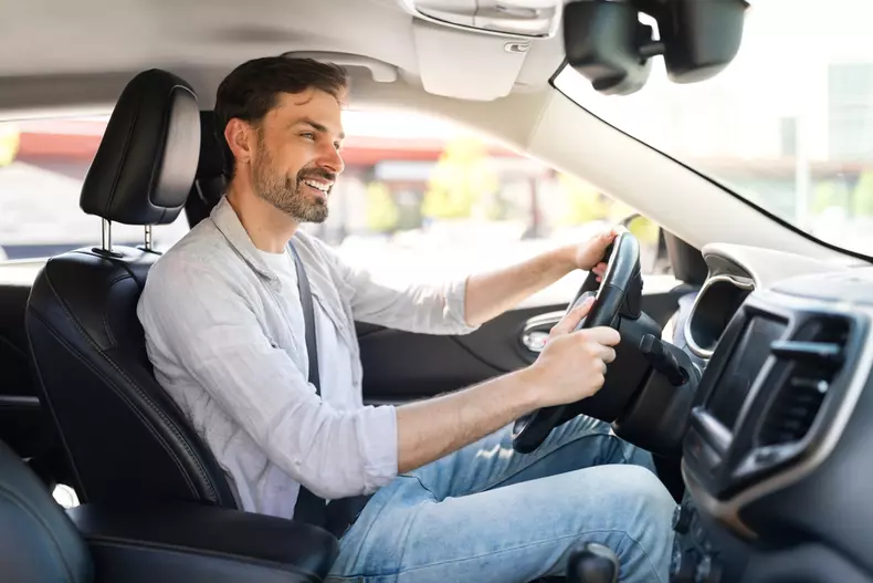 Happy,Cheerful,Handsome,Bearded,Young,Man,Wearing,Casual,Outfit,Driver