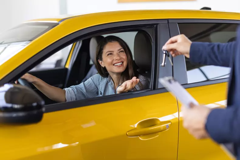 Car,Renting,Service.,Young,Woman,Driver,Taking,Keys,From,Manager