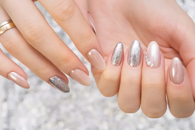 Hands with beautiful manicure. Natural nails with gel polish