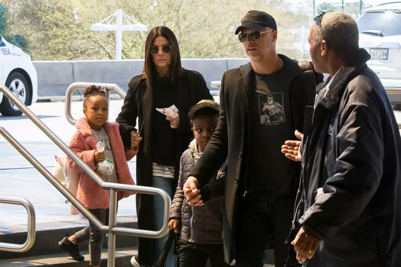 EXCLUSIVE: Sandra Bullock, children Louis and Laila, and boyfriend Bryan Randall after Mardi Gras celebrations in New Orleans.