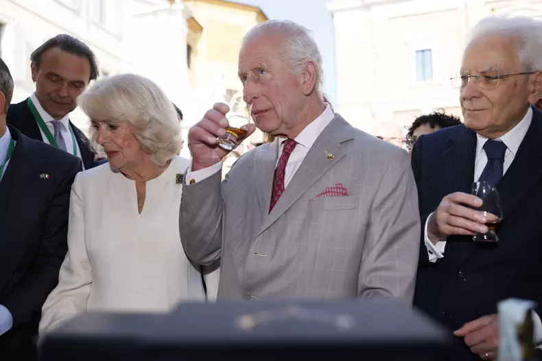 Ravenna, Italy. 10th Apr, 2025. King Charles III and Queen Camilla drink and eat during a visit to a UK-Emilia Romagna Food Festival at Piazza del Popolo, in the heart of Ravenna, on the last day of the four day state visit to Italy. Ravenna, Italy on Thu