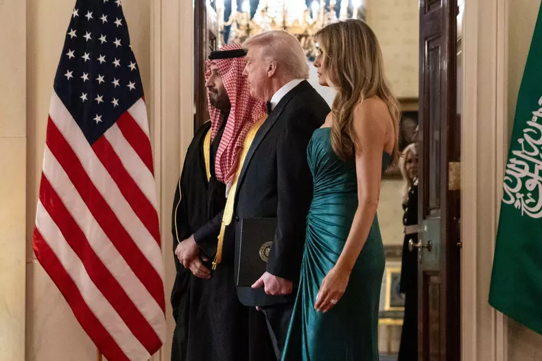 Saudi Arabian Crown Prince Mohammed bin Salman, President Donald Trump, and First Lady Melania Trump arrive for a dinner at the White House in Washington, on Nov. 18, 2025.